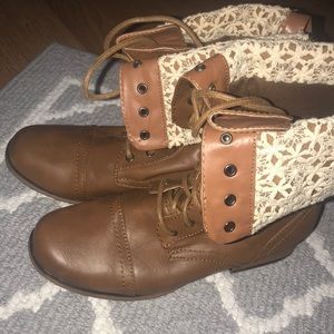 Brown boots with white lace detail